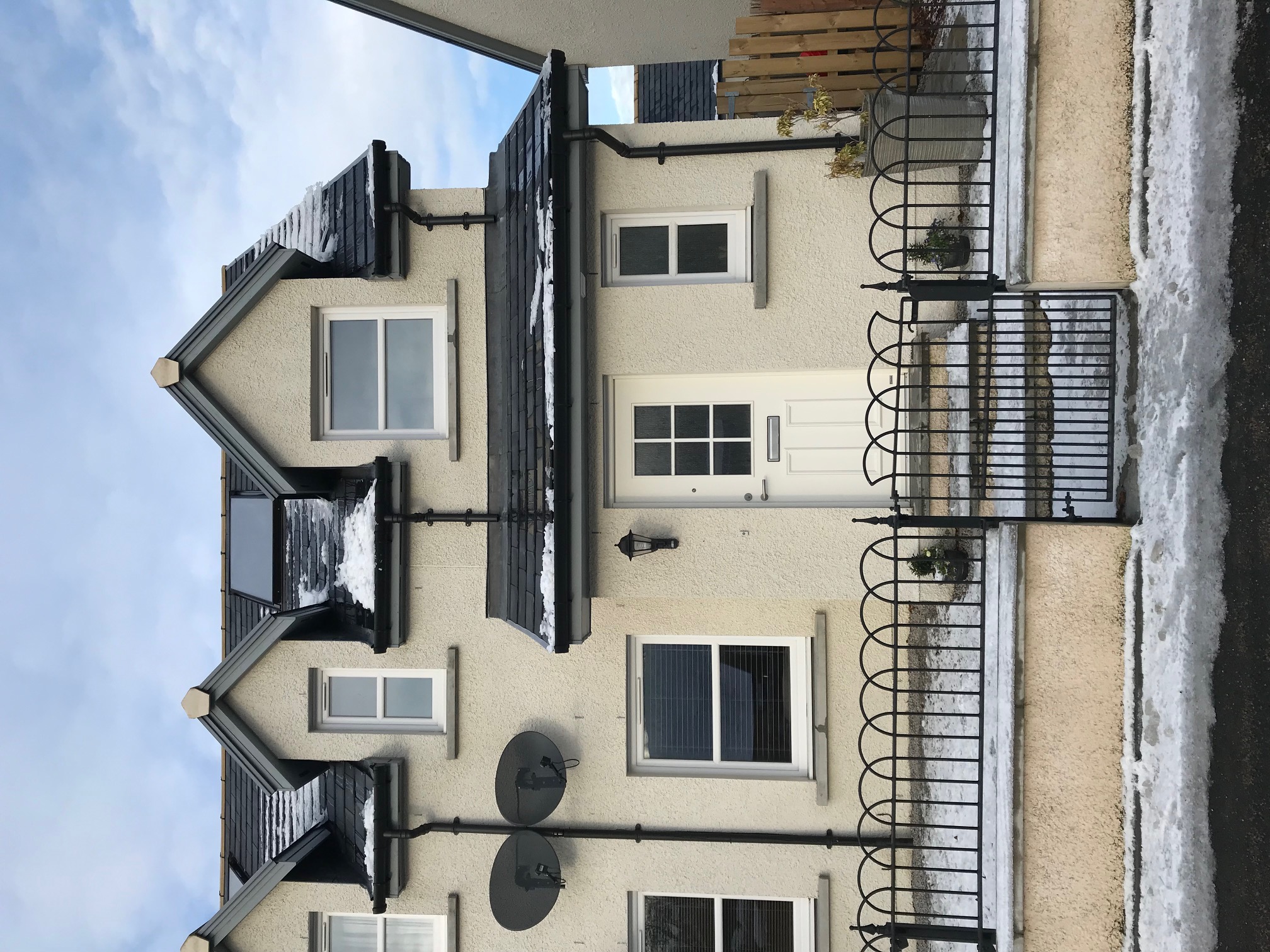 Front Of House at13B Main Road East in Echt with a gate into the front garden and paved steps to the front door