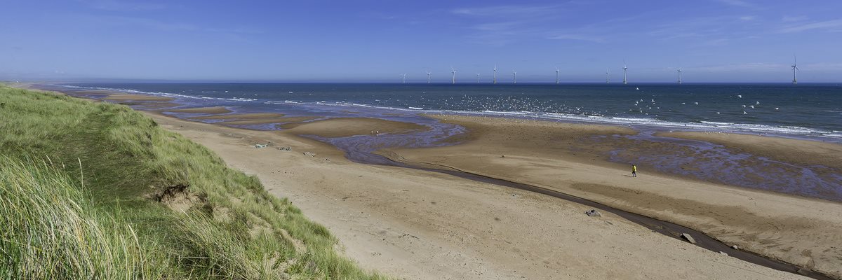 Balmedie beach with offshore wind farm in the background