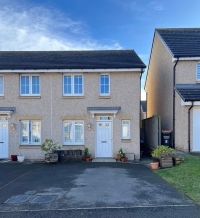 Front of 7 Bothiebrigs Drive, semi-detached house with paved driveway