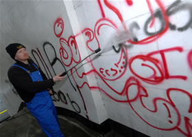 graffiti being removed