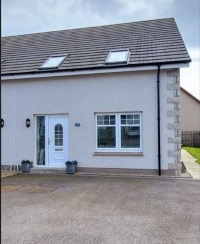 Front of 58 Ladysbridge Drive, detached house with paved driveway