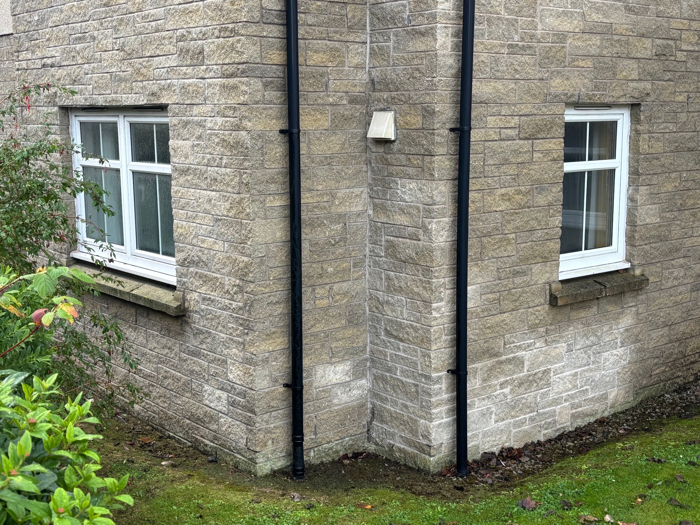 Corner of the 3 Craighall Lodge in Ellon with walls meeting at an angle and garden area in front