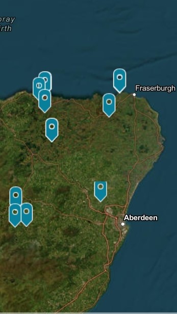 An aerial map of the north-east of Scotland with ten blue labels highlighting undeveloped housing sites in the area. 