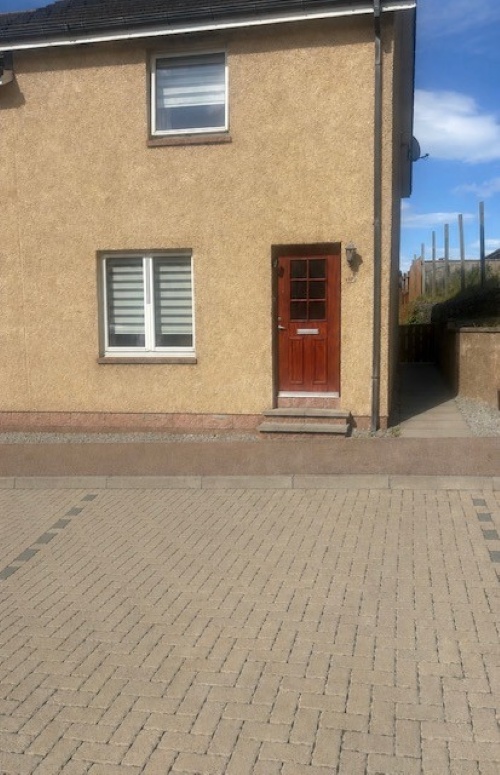 Front of 17 Blairmore Park, Rosehearty with parking space out front