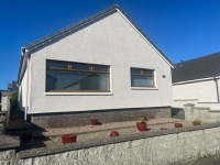 Front of 14 Kirkburn Drive in Peterhead showing street view of detached bungalow